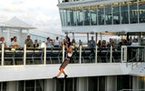 One of the first users to experience the Zip Line ride on the Oasis of the Seas.
