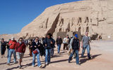 USTOA members, led by guide Mohammed Abdel Aal (in baseball cap), tour the temples at Abu Simbel near Lake Nasser in Upper Egypt.