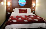 A Disney Dream stateroom with a virtual porthole.