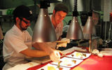 Sous-chefs plate a main course at Toque!