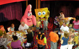 Patrick and SpongeBob SquarePants pose with children, and some adults, at the Nickelodeon character breakfast aboard the Epic.