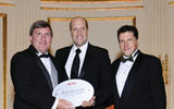 Sullivan and Travel Weekly Editor in Chief Arnie Weissmann, right, with Benjamin Sinclair, director of sales and marketing at the St. Regis New York. Sinclair accepted the Best Resort Worldwide award on behalf of the St. Regis Bora Bora. It was the resort's second consecutive win in the category.
