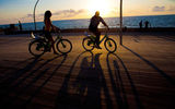 Cycling on the promenade in Tel Aviv.