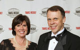 Rocky Mountaineer's sales director, Elizabeth Johnsen, and sales vice president, Bob Nicholas, accepted the Best Rail Vacations award.