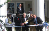 Vincent Vanderpool-Wallace, Bahamas minister of tourism and aviation; Sandals Chairman Butch Stewart; Sandals CEO Adam Stewart, and Frank Comito, vice president of the Bahamas Hotel Association cut the ribbon to open the Balmoral Tower.