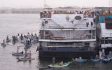 "Friendly pirates" -- souvenir vendors in rowboats -- swarm riverboats waiting to enter the Nile locks at the town of Esna.