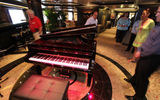 Martinis is home to a Steiner piano custom-designed by Dakota Jackson, who also designed the Vista and Oceania suites. Photo by Ralph Grizzle, http://www.avidcruiser.com/