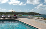 The pool deck at Exclusivity looks out over the ocean and offers stunning sunset views.