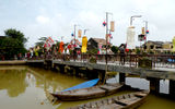 A bridge on the Thu Bon River in Hoi An, Vietnam; the town is a UNESCO World Heritage Site.