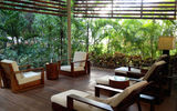 The outdoor lounge on the spa island, which has 12 stand-alone treatment cabanas are scattered among the trees.