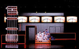Performers in a Holland America Line show in front of an LED panel display. The show is produced by RWS Associates.