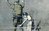 Famed graffiti artist Banksy has visited Bethlehem on several occasions; his works are displayed throughout the town.