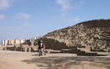 The ancient Huaca Pucllana pyramid in the middle of Lima's Miraflores district with high-rises visible in the background.