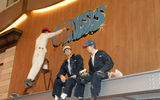One of the pieces of art in the ship's Royal Promenade is three statues of workers on the Oasis -- and one is cleaning up a sign that says Genesis, the name of the Oasis project.