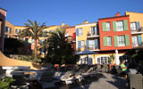 Exteriors of some of the ''houses'' that comprise the Hotel Byblos in Saint-Tropez.