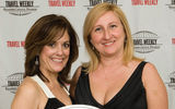 Holland America Line's Christine Stevens and Dawn Pennington with the Rookie of the Year plaque awarded to HAL's ship, the Eurodam. (photo by Steve Hockstein/Harvard Studio)
