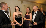 Steve Born, VP-marketing, Globus; Sinead O'Connell, account man., Vacation.com; Pam Massey, dir.-national accounts, Vacation.com; Scott Nisbet, COO, Globus. (photo by Steve Hockstein/Harvard Studio)