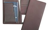 Sporting a soft, top grain leather cover, the Royce RFID Blocking Passport Ticket Holder has pockets for easily retrievable airline documents, business cards and currency. Of course, as its product name proclaims, this wallet, too, features RFID blocking ability. The Royce case, which measures 8.5 by 4.12 by 0.5 inches, comes in black and tan.