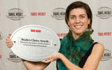 Clara Barrenche, the Catalonia Investment Agency's director for North America, accepts the Best European City award for Barcelona. (photo by Steve Hockstein/Harvard Studio)