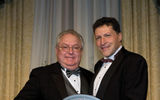 Tom Karins, left, executive director-leisure travel sales, Canadian Tourism Commission, and Arnie Weissmann of Travel Weekly. (photo by Lisa Quinones/Black Star)