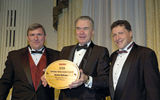 Gordon Bethune, center, with Bob Sullivan, left, and Arnie Weissmann. (photo by Lisa Quinones/Black Star)