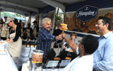 Chef and TV celebrity Guy Fieri helped to kick off Hampton Hotels' new breakfast program in New York's Herald Square Park on June 17. Here, Fieri serves waffles to New York residents Patricia Dyett and Jay Silva.