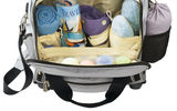 The TravelSmith Plane Case, which comes with four swivel wheels for the utmost in maneuverability, packs quite a load while still fitting underneath most airline seats. The ultrapractical carry-on offers three front top-zippered openings, two side pockets, a 40-inch telescoping handle and a detachable waterproof cosmetics holder. The bag, which comes in three solid colors and three quilted colors, also includes a mini tote free of charge.