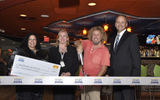 Sammy Hagar celebrates the grand opening of Sammy's Beach Bar & Grill at JFK's British Airways Terminal 7. Pictured (from left): Minerva Delgado, Food Bank for New York City; Maureen Borrell, British Airways; Sammy Hagar, The Hagar Family Foundation; and Joe Waller, HMSHost Corp.