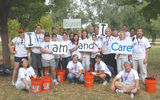 More than 25 Vacation.com employees participate in Tourism Cares for America Volunteer Day to paint park benches, posts and chains that line the walkways around key monuments along D.C.'s National Mall and Tidal Basin.