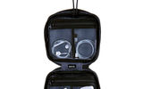 A perfect accessory for the well-connected traveler, the SKITS Smart Case combines function and fashion in a lightweight (8 ounces) kit that measures only 7.5 by 7 by 1.5 inches. Designed specifically to house cords, cables and other high-tech accessories, the case offers four soft, see-through pouches; expandable elastic pocket separators; a multi-layered, water-resistant material; zippers; side gussets for extra space; and an attached loop hang.
