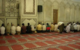 Men praying at Umayyad Mosque in Old Damascus.