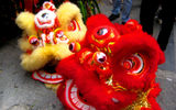 Often missed by visitors, China's booming southern metropolis of Guangzhou and the more remote Zhangjiajie, in Hunan province, offer travelers a vivid combination of modern cityscapes, rich culture, and dramatic natural beauty. Pictured here, masks from a traditional lion dance celebration in the streets of Guangzhou. Unless noted, photos by Shane Nelson.