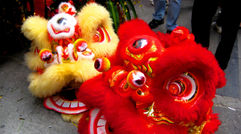 Often missed by visitors, China's booming southern metropolis of Guangzhou and the more remote Zhangjiajie, in Hunan province, offer travelers a vivid combination of modern cityscapes, rich culture, and dramatic natural beauty. Pictured here, masks from a traditional lion dance celebration in the streets of Guangzhou. Unless noted, photos by Shane Nelson.