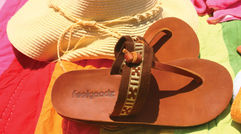 What's New, What's Hot is Travel Weekly's look at useful and fun travel gadgets, edited by Joe Rosen. Travel-related attire, from head to toe, is the theme for this month. First up, Feelgoodz Flopz. The company that sells these flip-flops prides itself on producing all-natural footgear constructed without PVCs, toxins and artificial dyes. In addition, the Thai and Vietnamese farmers and Hmong weavers are paid at or above fair market value for what they normally earn at the market for their goods.