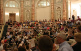 Tourists fill the seats at the Hermitage Theatre in St. Petersburg for a ballet performance of Swan Lake
