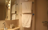 The bathrooms are equipped with a standing shower and L'Occitane products