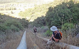 Kiesnoski, at bottom, and his brother hike their way up Mount Carmel in a LionOps endurance exercise, using a set of waterpipes to guide them up 1,200 feet