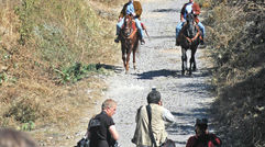 Travel Weekly's editor in chief, Arnie Weissmann, accompanies a TV film crew on President Felipe Calderon's personal tour of his country. Pictured here, CBS News travel editor Peter Greenberg and Mexico's president, Felipe Calderon, explore the Jose Cuervo estate in Tequila on horseback during the filming of the PBS special "Mexico: The Royal Tour." TW photo by Arnie Weissmann
