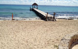 The beachfront at the Viceroy has a private pier where guests can take yoga classes