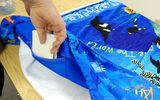 At once a colorful beach towel that can be folded into a beach bag, the Towel Bag also serves as a secure and inconspicuous repository for your valuables while you are off splashing in the waves or touring an island village. This product has two 10x16-inch hidden pockets for water bottles, sun screen and the like as well as a super-secret 7x7-inch pocket for your watch, keys and cell phone. Constructed to be wind resistant, the towel includes bungee cords that can be attached to the posts of a chair or to sand pegs (included) for sand or grass.