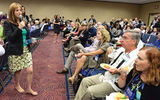 Vicki Freed of Royal Caribbean goes barefoot during the Think Tank