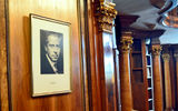 A portrait of Max Reinhardt, theater director and co-founder of the Salzburg Festival, hangs inside the library