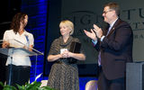 Signature Travel Network honored member agent Carol Lekki, center, president of Carol’s Travel Service in Tinley Park, Ill., as the first recipient of the Michelle Morgan Leadership Award at its Sales Meeting & Trade Show at the MGM Grand in Las Vegas. The award is named for the former Signature president who died in 2013 and recognizes industry professionals who embody the qualities that made Morgan a success both professionally and personally. Lekki accepts her award from Signature execs Alisa Morgan, Morgan’s daughter, and Alex Sharpe