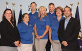 CruiseOne awarded free travel franchises to five U.S. military veterans who won its third annual “Operation Vetrepreneur: Become Your Own General” contest. Nearly 150 veterans submitted applications for this year’s contest. Front row, from left: Debbie Fiorino of CruiseOne; Air Force veteran Ingrid Markham; Army and National Guard veteran Tammy Duffield; Navy veteran Marci Dewitt; and Tim Courtney, CruiseOne. Back, from left: Navy veteran Craig Markham and Marine Corps vet Conrad Carpenter