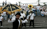 Second Line Marshal, Jennifer Jones, performs before leading the procession of volunteers to Louis Armstrong Park. (photo by Judi Bottoni)