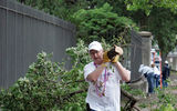 A volunteer at Louis Armstrong Park, giving the clean-up effort his all. (photo by Judi Bottoni)