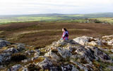 Gavriela Rice Langer rests after running with the winds that constantly blow around Mynyndd Bodafan.