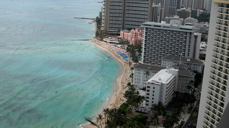 Hawaii's most famous beach is still Waikiki Beach in Honolulu, and its most iconic hotel is still the pink Royal Hawaiian.  Managing Editor Rebecca Tobin captured the following photos of Oahu hotels and highlights, starting with views from the penthouse floor of the Aston Waikiki Beachside Hotel.