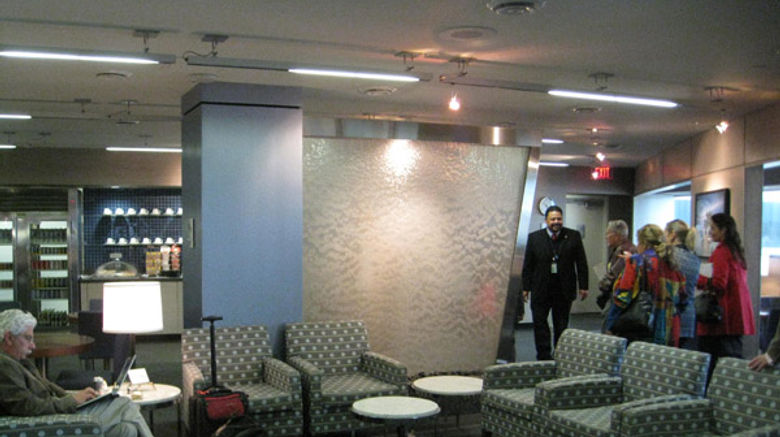 Walter Vergara, marketing director for airport terminal management, welcomes visitors in the "non-alliance" VIP lounge.