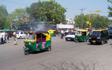 Delhi's legion green and yellow auto-rickshaws are, in fact, glorified mopeds.